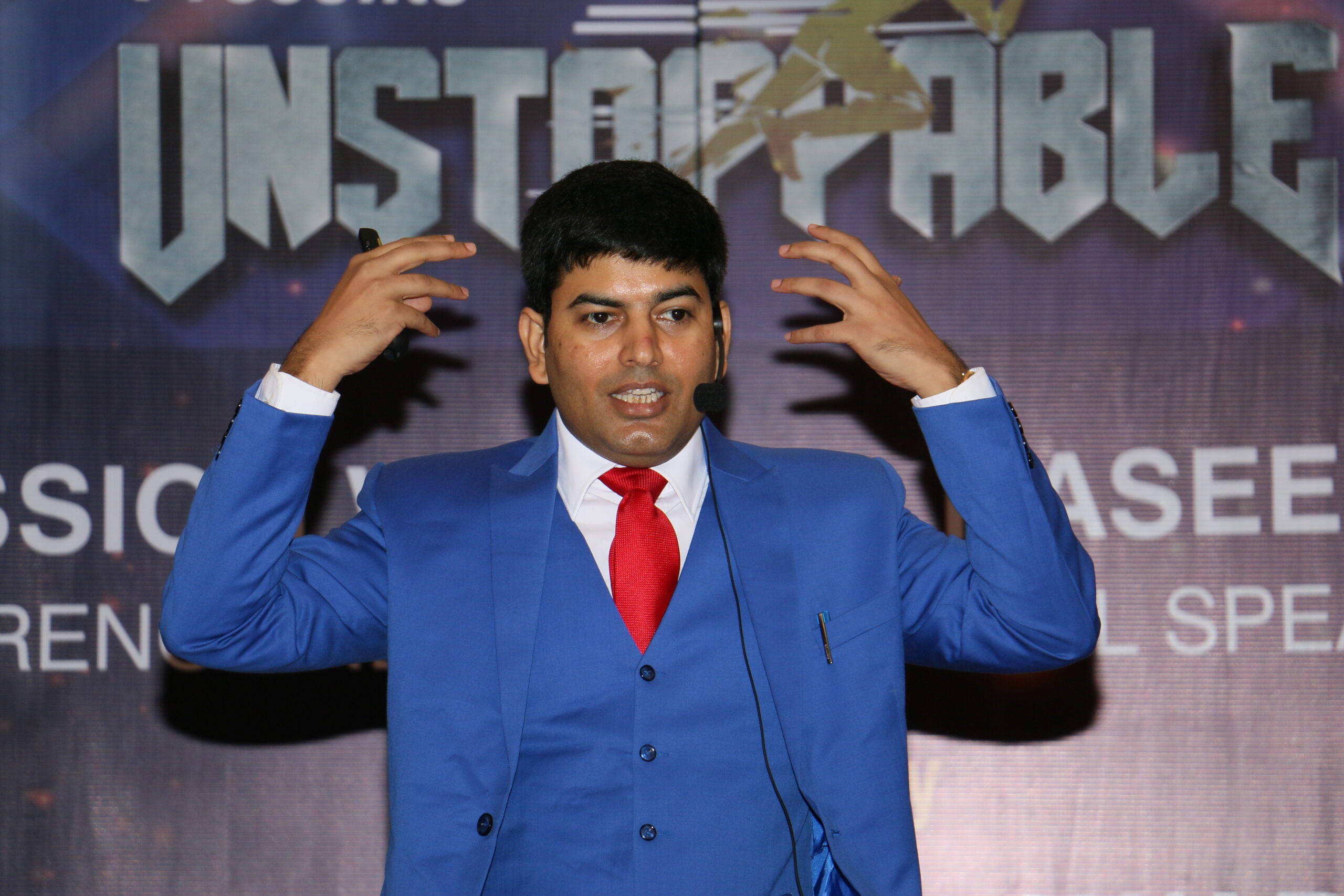 Naseer Khan delivering a Neuro Coding keynote to a corporate audience in India